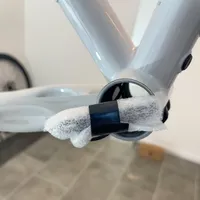 The junction fully wrapped by the packaging that is fixated with electrical tape