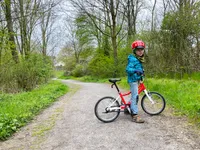 Emil with his Woom bicycle