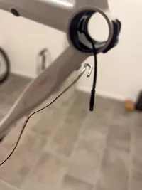 Pulling the Di2 plug out of the seat tube into the bottom bracket shell
