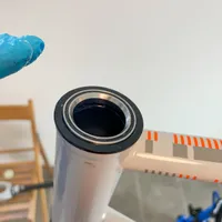 The top bearing completely inserted into the top cup