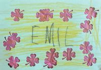 A name plate with the pencil-written name 'Emil'