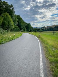 A curvy road winding down