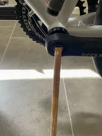 One stick attached to the bottom bracket axcle of the crank arm