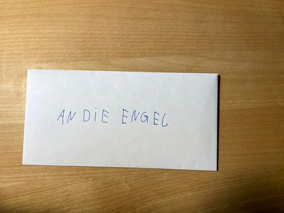The envelop has the address in german: An die Engel