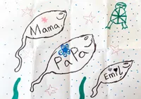 A drawing of three fishes, papa is the biggest, followed by mama, then Emil.