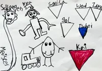 A mostly black and white sketch sign and names of Ninjago figures, like Nya and Gol.